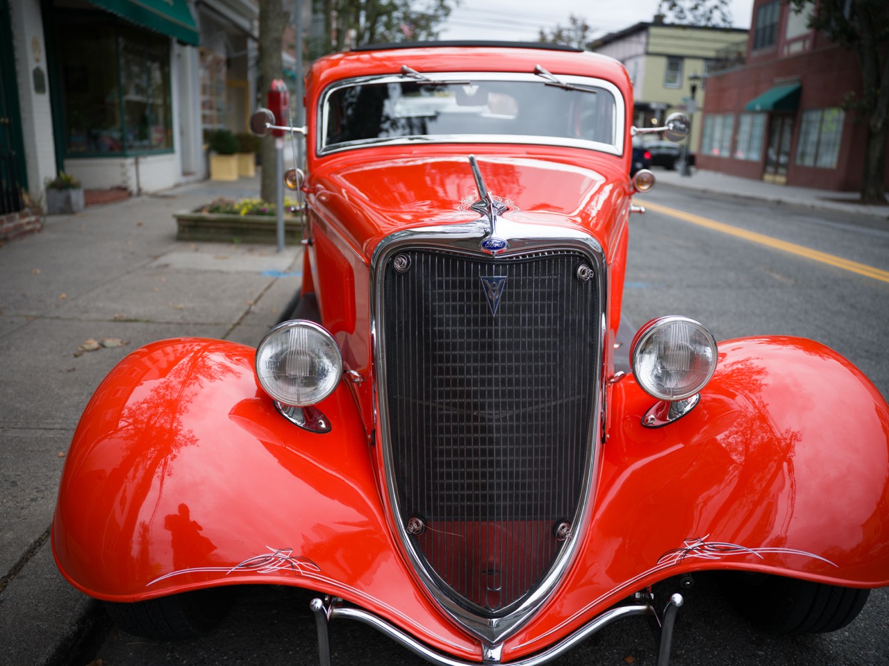 wide shot of a vintage ford car
