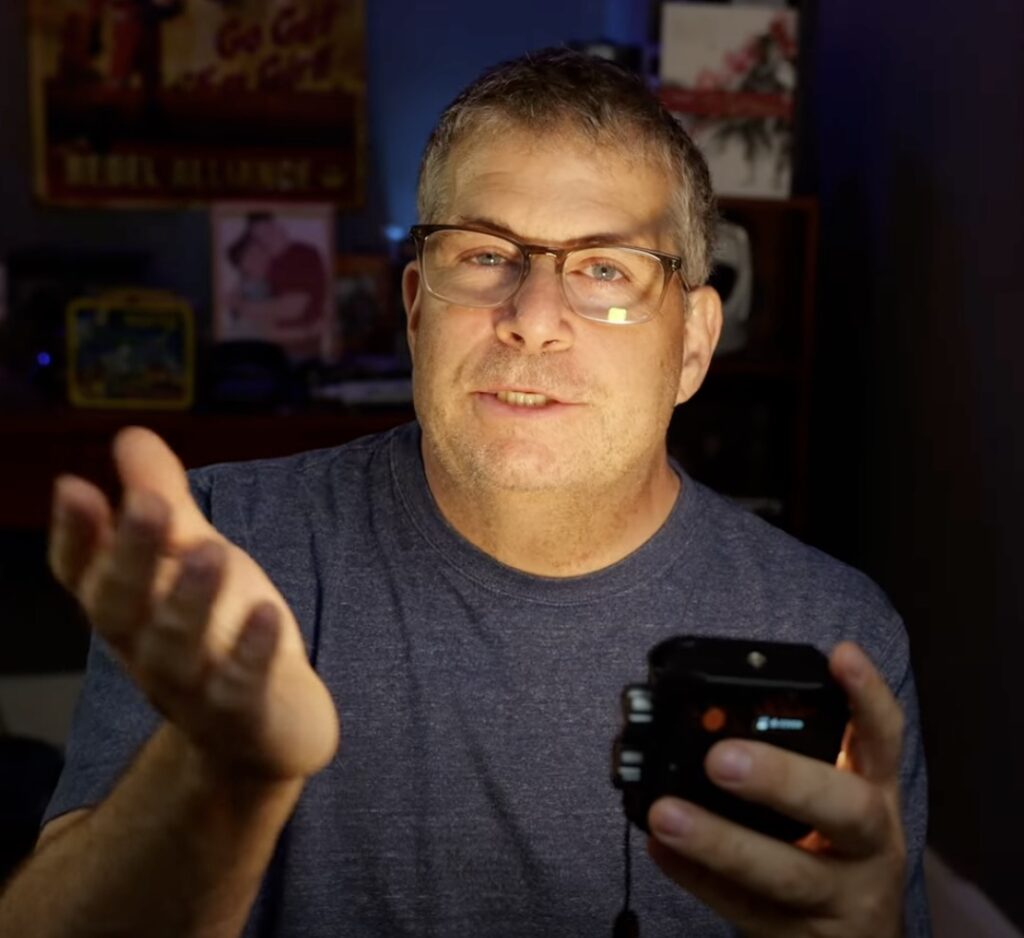 Reviewer demonstrating how he appears illuminated by the K&F RGB Video Light
